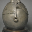 Saxophone Buddha, a bronze sculpture by John Leon